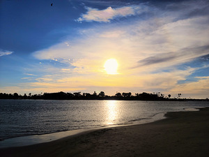 Soft Waves Carry the Day’s Goodbye