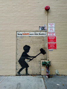 Banksy on Broadway Boy Hammering Hydrant