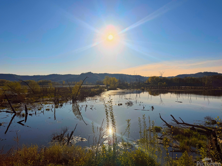 Sunrise Over Tranquil Wetlands with Sunbeam Reflection  Print