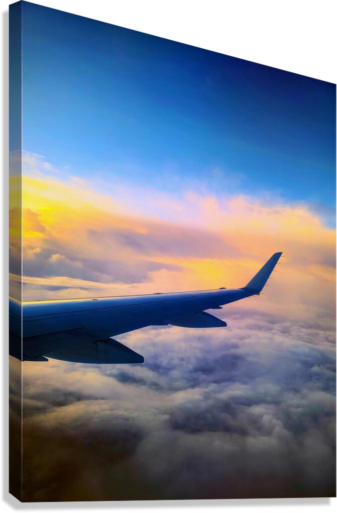 Above the Clouds: Flying into the Sunrise Canvas Print